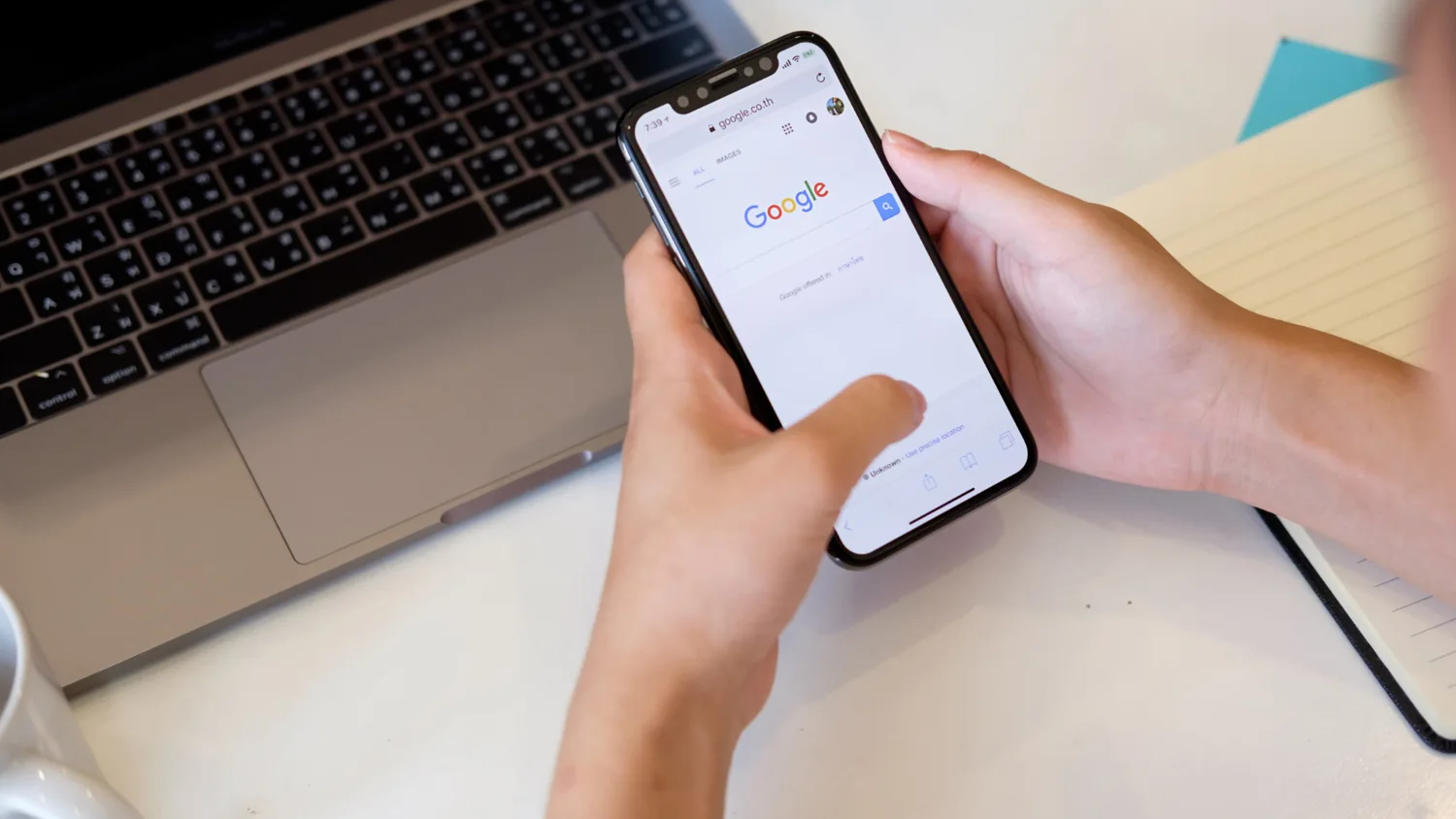 Digital work and business information on a laptop and phone