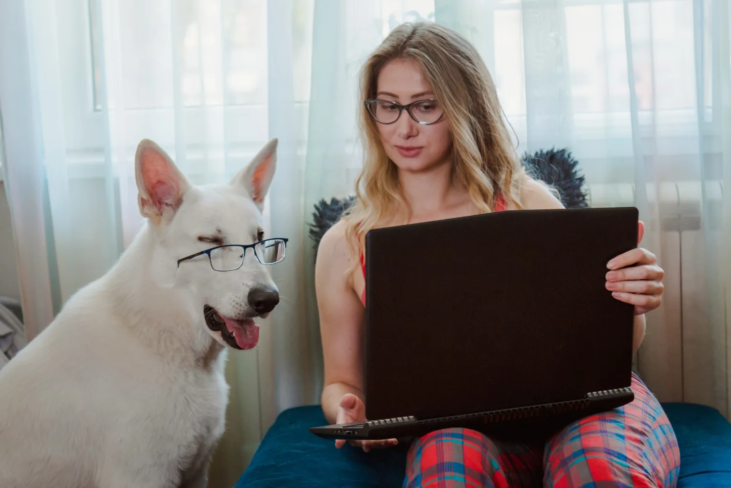 Remote team member working on a laptop